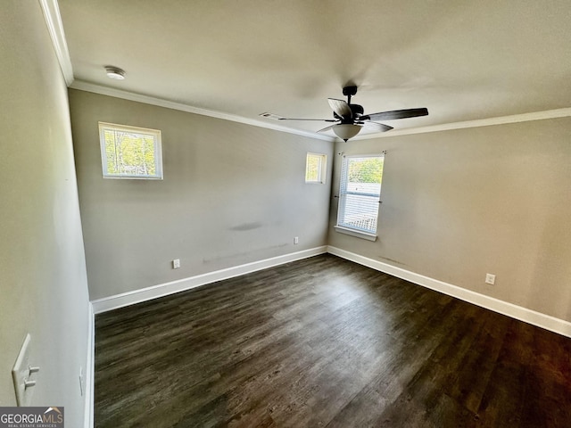 1037 E Doyle St, Toccoa, GA 30577 - spare room with ornamental molding, a smoke detector, dark wood-style flooring, and ceiling fan