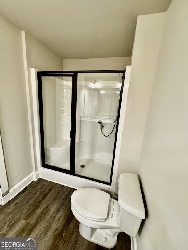 1037 E Doyle St, Toccoa, GA 30577 - bathroom featuring wood finished floors and a shower stall