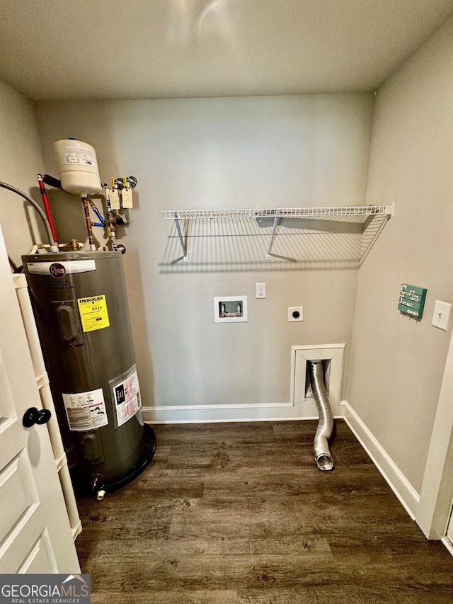 1037 E Doyle St, Toccoa, GA 30577 - washroom with water heater, dark wood-style flooring, hookup for an electric dryer, and washer hookup