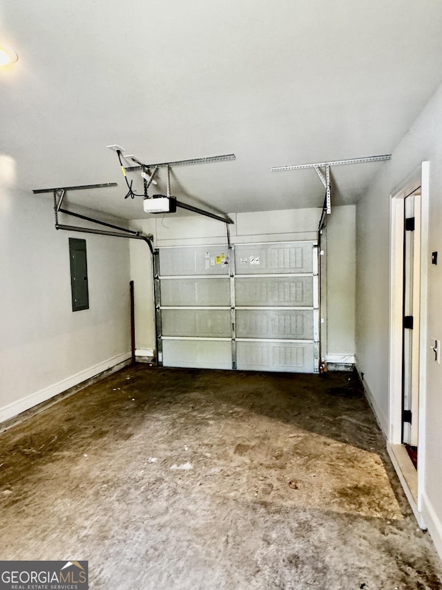 1037 E Doyle St, Toccoa, GA 30577 - garage featuring electric panel and a garage door opener