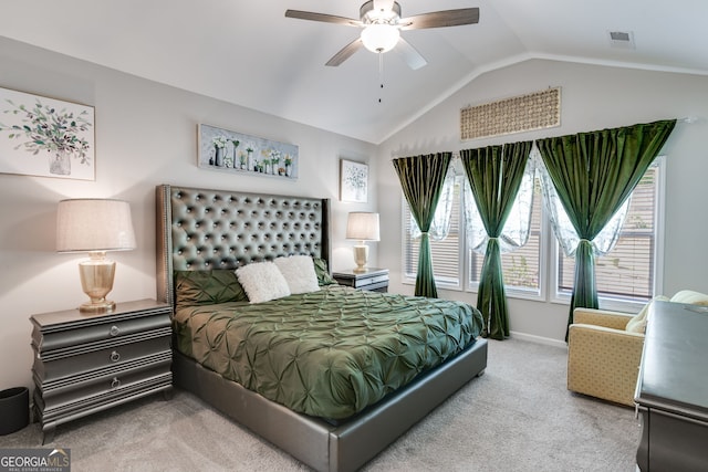 bedroom featuring carpet, vaulted ceiling, visible vents, a ceiling fan, and baseboards