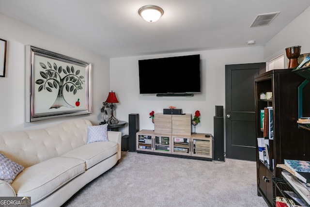 carpeted living room with visible vents