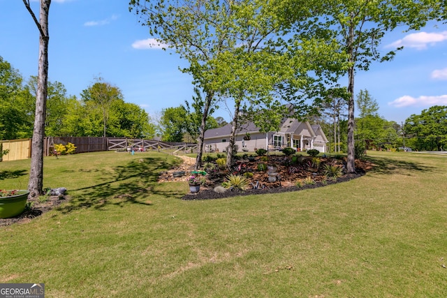 view of yard with fence