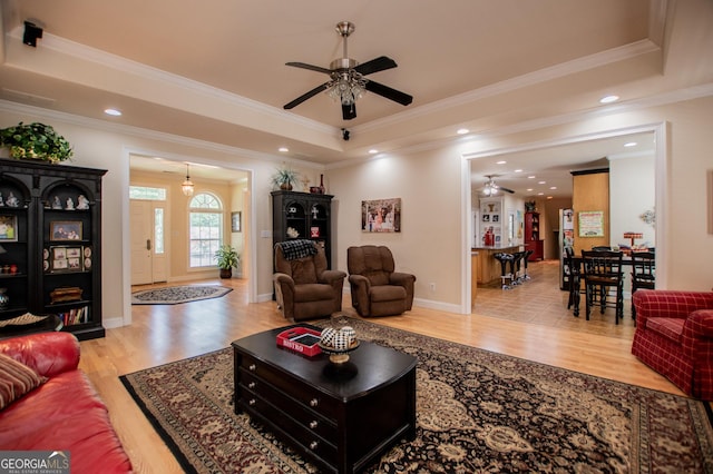 4149 Yancey Rd, Douglasville, GA 30135 - living area featuring a raised ceiling, wood finished floors, and a ceiling fan