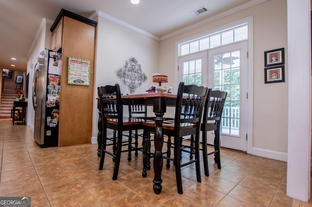 4149 Yancey Rd, Douglasville, GA 30135 - dining area with recessed lighting, light tile patterned floors, visible vents, and ornamental molding