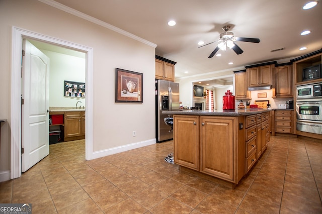 4149 Yancey Rd, Douglasville, GA 30135 - kitchen featuring recessed lighting, under cabinet range hood, crown molding, and appliances with stainless steel finishes