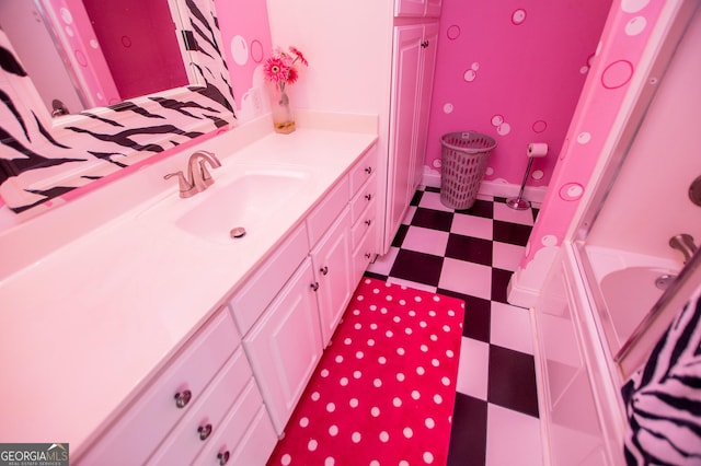 4149 Yancey Rd, Douglasville, GA 30135 - bathroom featuring tile patterned floors and vanity