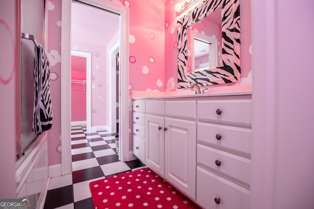 4149 Yancey Rd, Douglasville, GA 30135 - bathroom featuring tile patterned floors and vanity
