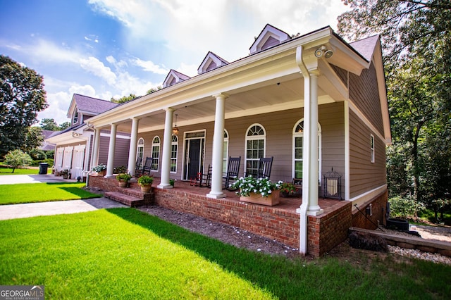 4149 Yancey Rd, Douglasville, GA 30135 - view of front facade featuring a front lawn and covered porch