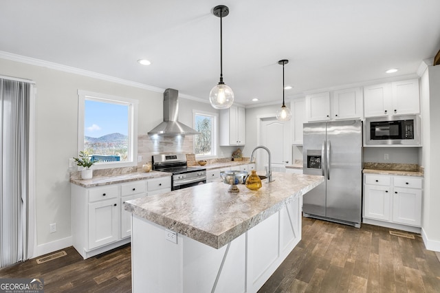 350 Pea Ridge Rd, Ball Ground, GA 30107 - kitchen with stainless steel appliances, wall chimney exhaust hood, dark wood-style floors, light countertops, and crown molding