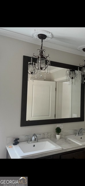 350 Pea Ridge Rd, Ball Ground, GA 30107 - bathroom featuring a chandelier, ornamental molding, and double vanity
