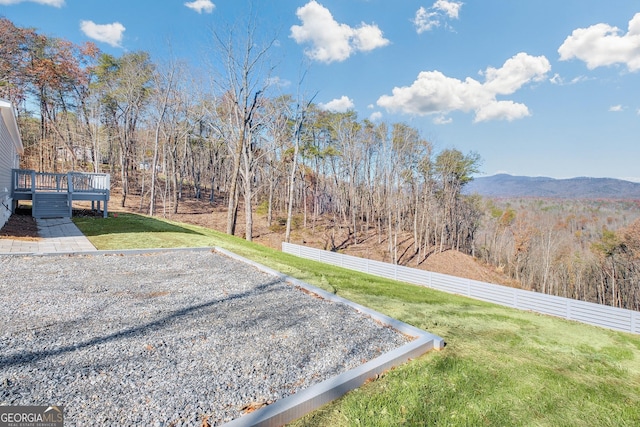 350 Pea Ridge Rd, Ball Ground, GA 30107 - view of yard with a deck with mountain view