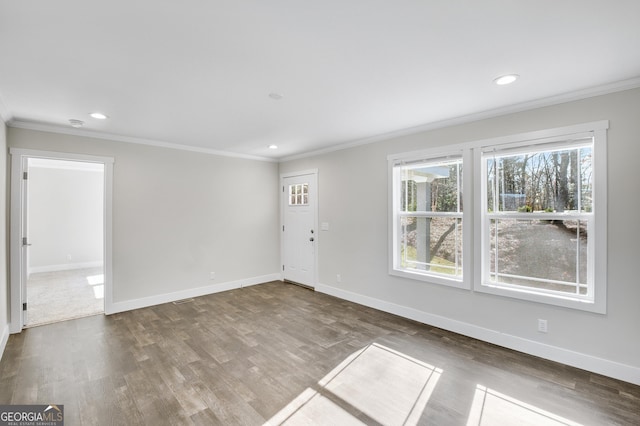 350 Pea Ridge Rd, Ball Ground, GA 30107 - entrance foyer featuring crown molding, recessed lighting, wood finished floors, and baseboards