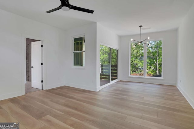 644 Glendale Rd, Scottdale, GA 30079 - interior space featuring a healthy amount of sunlight, light wood finished floors, and baseboards