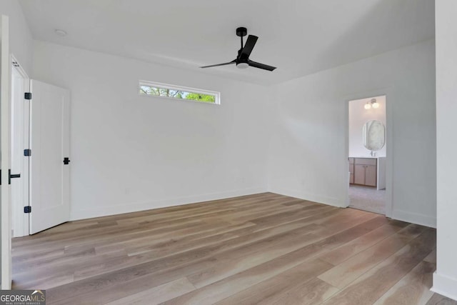 644 Glendale Rd, Scottdale, GA 30079 - empty room with ceiling fan, wood finished floors, and baseboards