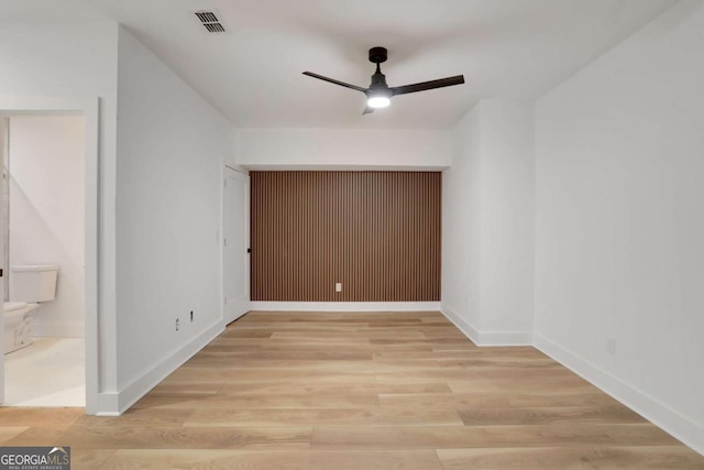 644 Glendale Rd, Scottdale, GA 30079 - interior space featuring visible vents, baseboards, a ceiling fan, light wood finished floors, and connected bathroom