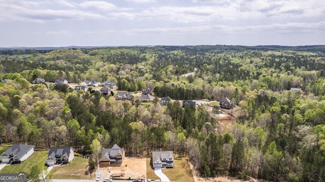 bird's eye view with a residential view and a forest view