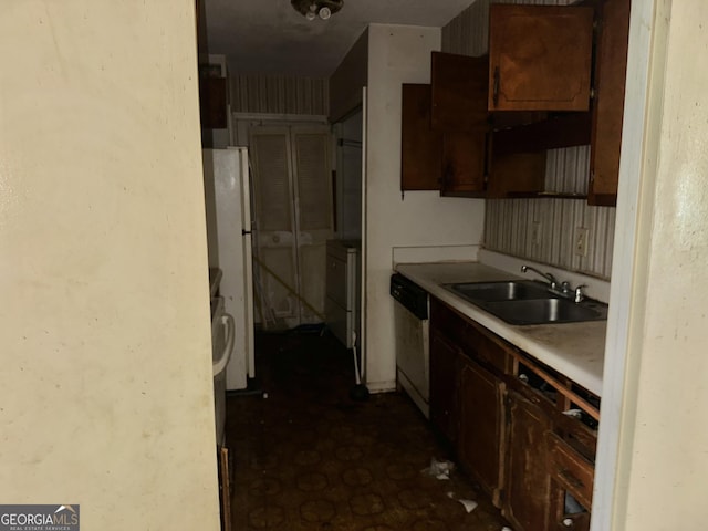 3038 Parc Lorraine, Lithonia, GA 30038 - kitchen with light countertops, freestanding refrigerator, open shelves, dishwashing machine, and a sink