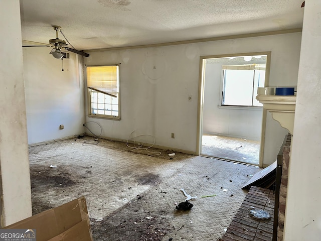 3038 Parc Lorraine, Lithonia, GA 30038 - spare room with a textured ceiling and a ceiling fan