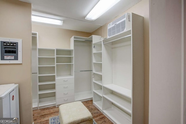 spacious closet featuring wood finished floors