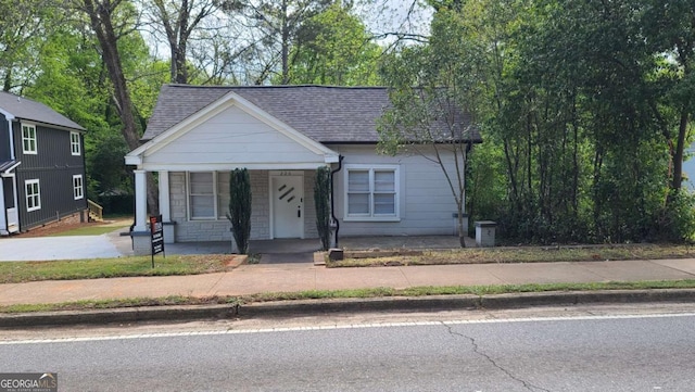 226 Vine St, Athens, GA 30601 - view of front of property featuring a shingled roof and covered porch