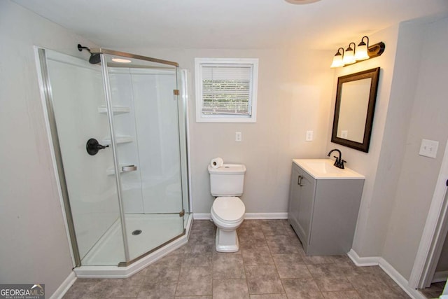 226 Vine St, Athens, GA 30601 - bathroom featuring vanity, a shower stall, and tile patterned floors