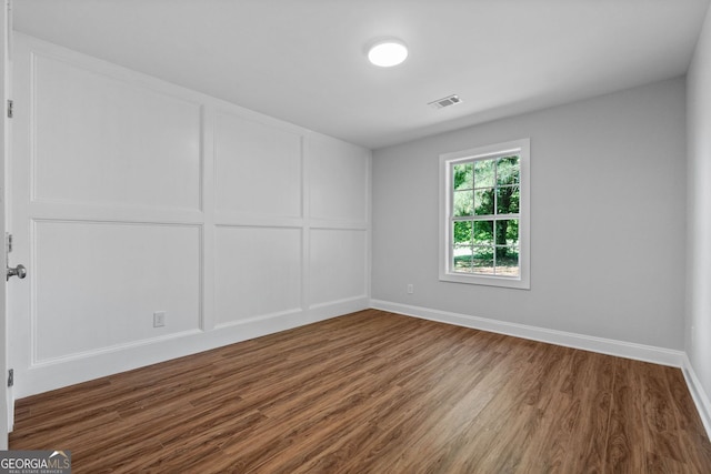 485 Swint Rd, Griffin, GA 30224 - spare room featuring dark wood-type flooring and baseboards