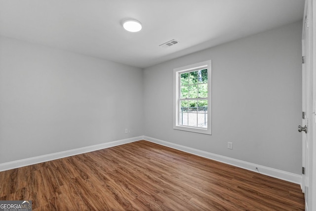 485 Swint Rd, Griffin, GA 30224 - unfurnished room featuring dark wood finished floors and baseboards