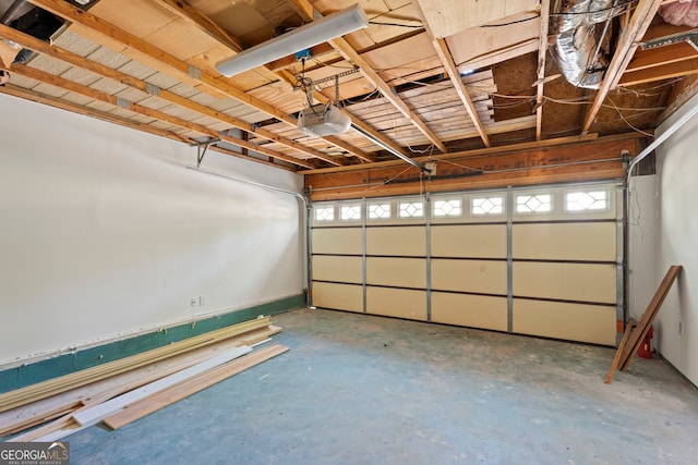 garage featuring a garage door opener