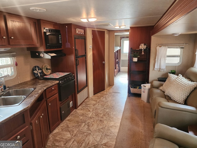 84 27th St, Ellijay, GA 30540 - kitchen featuring a sink, open floor plan, black microwave, and a wealth of natural light