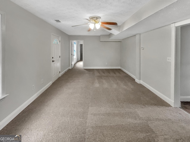 6367 Deshong Dr, Lithonia, GA 30058 - carpeted spare room featuring ceiling fan and a textured ceiling