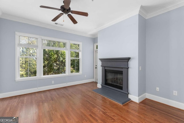 11 Perimeter Ctr E Unit 1404, Atlanta, GA 30346 - unfurnished living room with wood finished floors, a glass covered fireplace, ornamental molding, and a ceiling fan