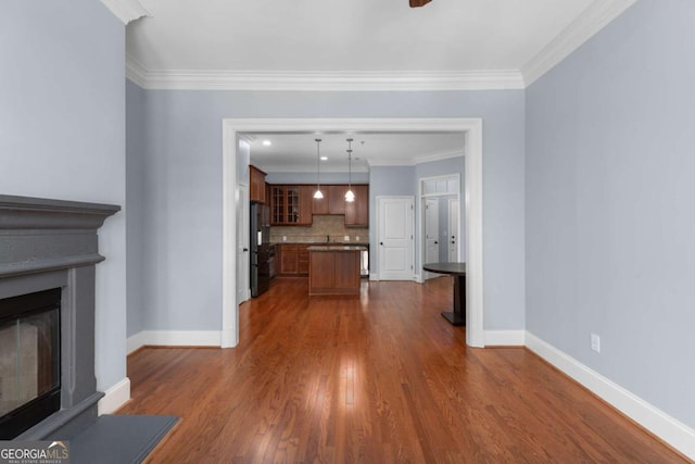 11 Perimeter Ctr E Unit 1404, Atlanta, GA 30346 - unfurnished living room with a glass covered fireplace, dark wood-style floors, and ornamental molding