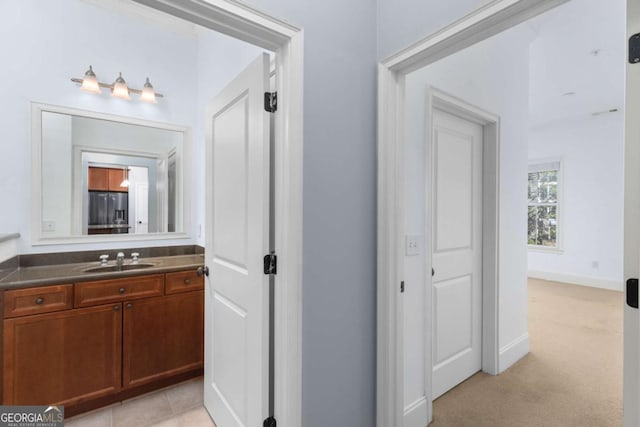 11 Perimeter Ctr E Unit 1404, Atlanta, GA 30346 - bathroom with vanity and baseboards