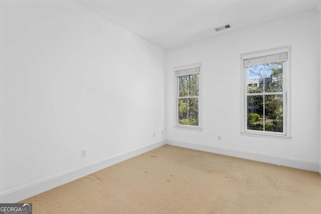 11 Perimeter Ctr E Unit 1404, Atlanta, GA 30346 - spare room with light carpet and baseboards