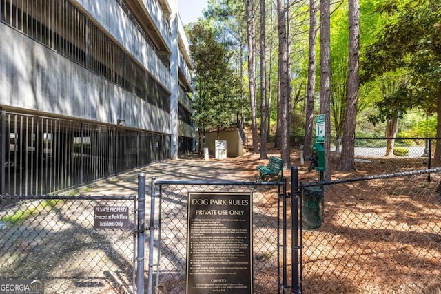 11 Perimeter Ctr E Unit 1404, Atlanta, GA 30346 - view of property's community featuring a dog friendly area and a gate