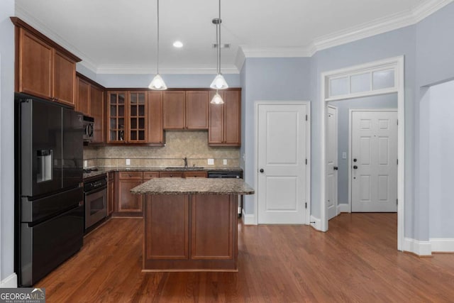 11 Perimeter Ctr E Unit 1404, Atlanta, GA 30346 - kitchen featuring black appliances, backsplash, glass insert cabinets, dark wood-type flooring, and crown molding