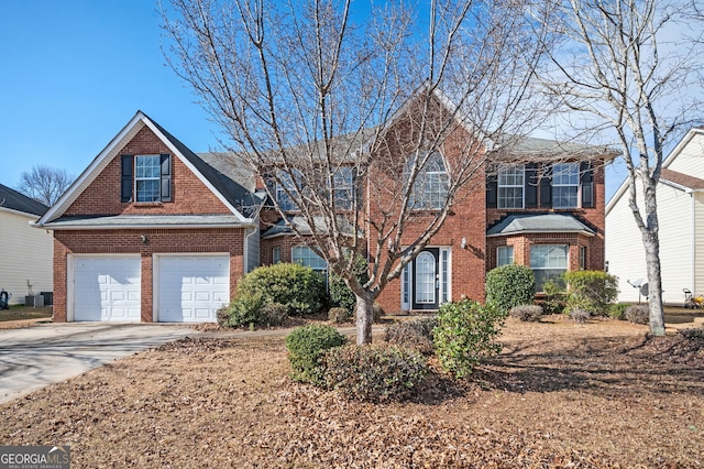 view of front of home with an attached garage, brick siding, and driveway