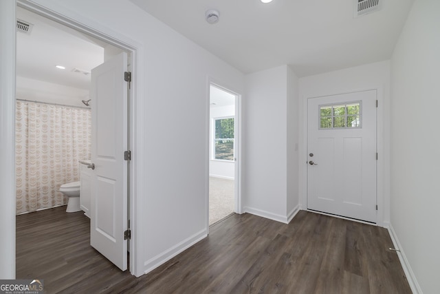 100 N Stewart Ln, Griffin, GA 30224 - entryway featuring baseboards, dark wood-style floors, and visible vents