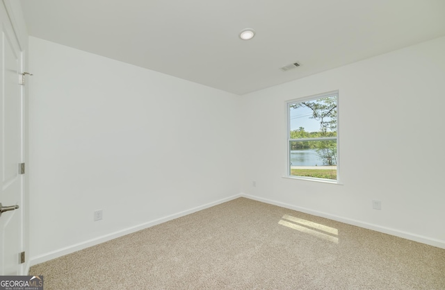 100 N Stewart Ln, Griffin, GA 30224 - unfurnished room with visible vents, baseboards, recessed lighting, and carpet floors