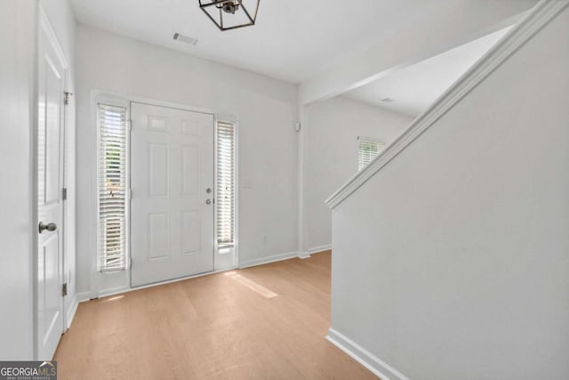 7431 Saint David St, Fairburn, GA 30213 - entryway featuring light wood finished floors and plenty of natural light