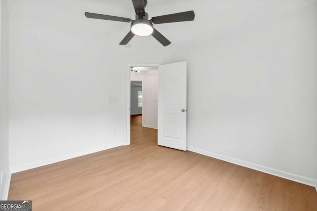 7431 Saint David St, Fairburn, GA 30213 - spare room featuring light wood-type flooring and a ceiling fan