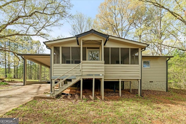 5026 Daniel Mill Rd, Winston, GA 30187 - back of house featuring a sunroom, stairs, driveway, and an attached carport