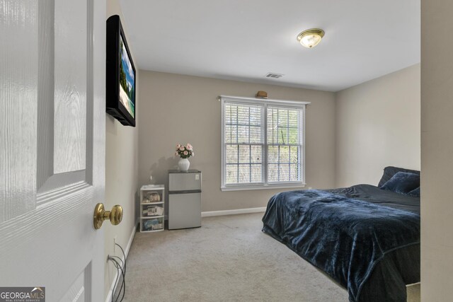 1812 Mountain Lake Dr NW, Kennesaw, GA 30152 - carpeted bedroom with freestanding refrigerator and baseboards