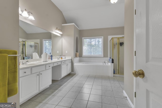 1812 Mountain Lake Dr NW, Kennesaw, GA 30152 - full bath with vaulted ceiling, double vanity, a shower stall, a bath, and tile patterned flooring