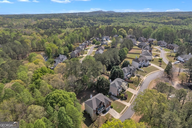 1812 Mountain Lake Dr NW, Kennesaw, GA 30152 - view of property location with a heavily wooded area and nearby suburban area
