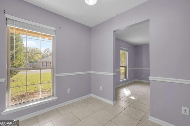 210 Preakness Dr, Hinesville, GA 31313 - spare room with light tile patterned floors and baseboards