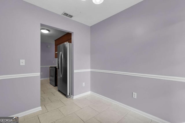 210 Preakness Dr, Hinesville, GA 31313 - empty room with light tile patterned floors, baseboards, and visible vents