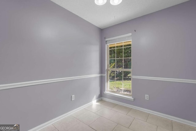 210 Preakness Dr, Hinesville, GA 31313 - tiled empty room with baseboards