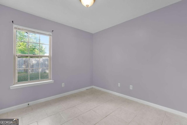 210 Preakness Dr, Hinesville, GA 31313 - empty room featuring baseboards and light tile patterned flooring
